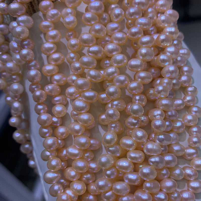 5-6mm peach baroque pearl drill on top