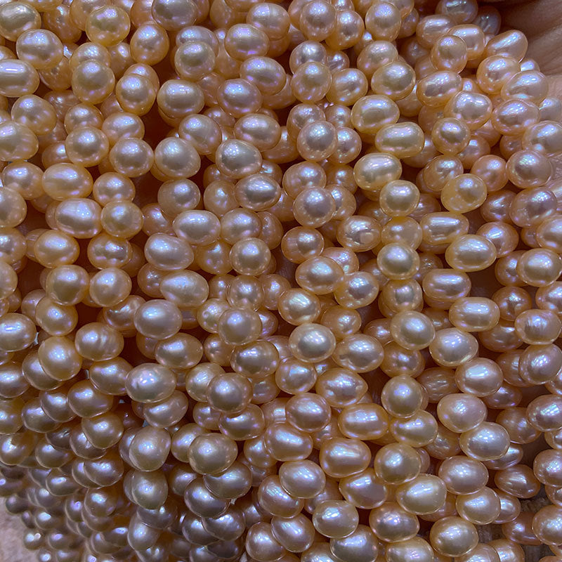 5-6mm peach baroque pearl drill on top