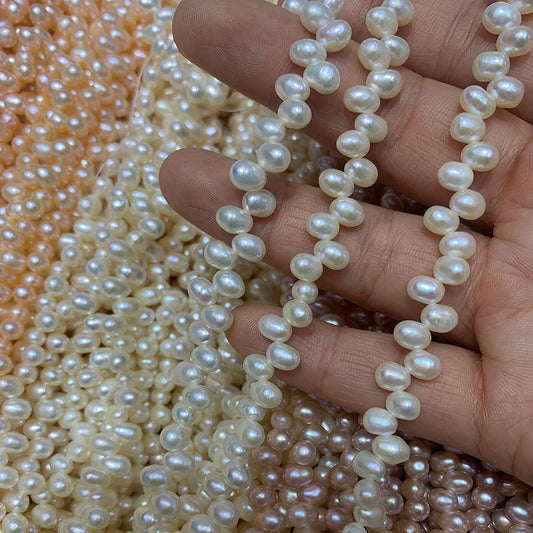 5-6mm white baroque pearl drill on top