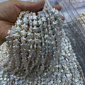 10-12mm star pearl strand white.