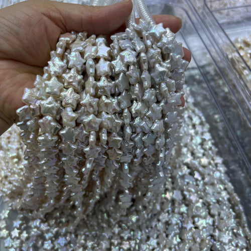 10-12mm star pearl strand white.