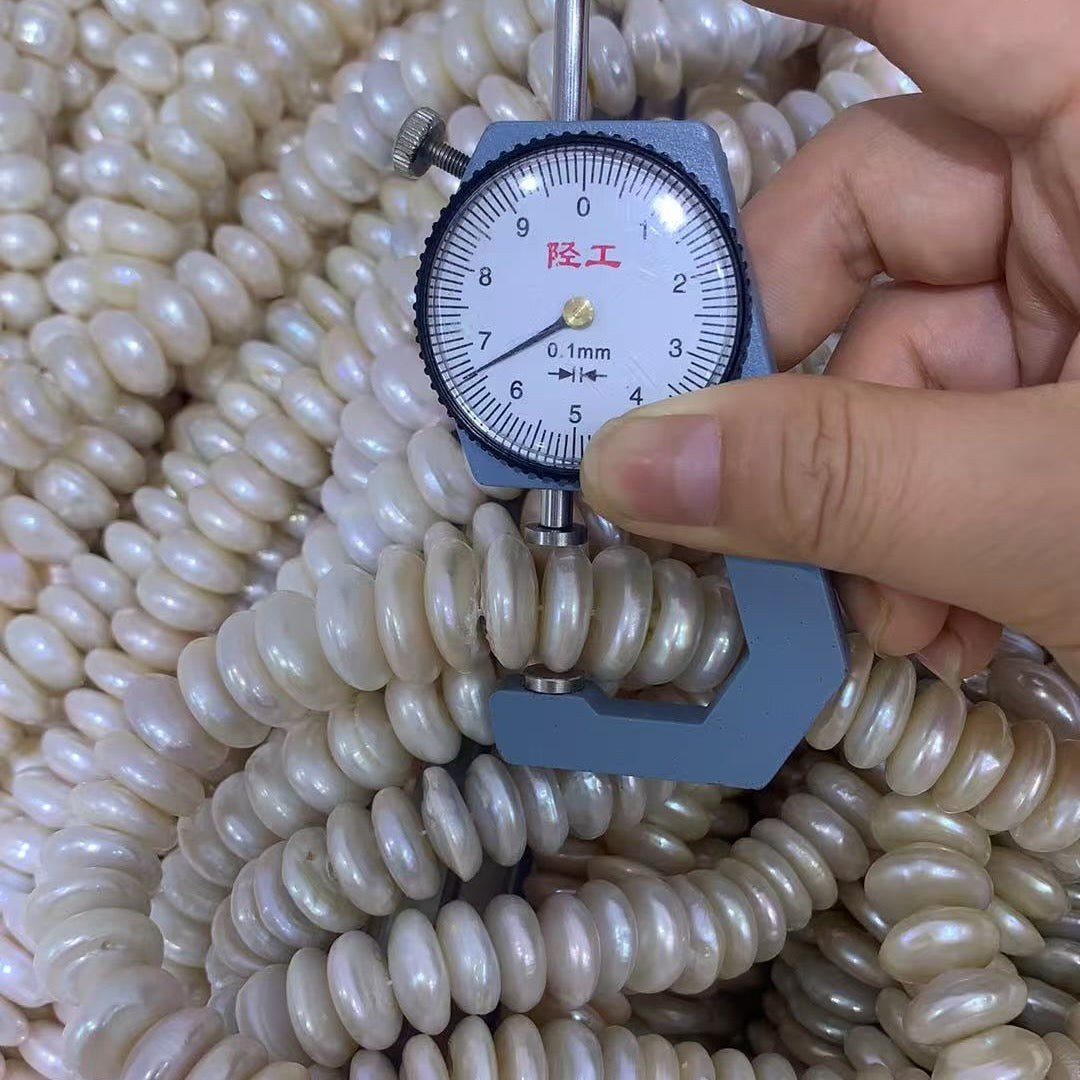 16mm_coin_pearl strand