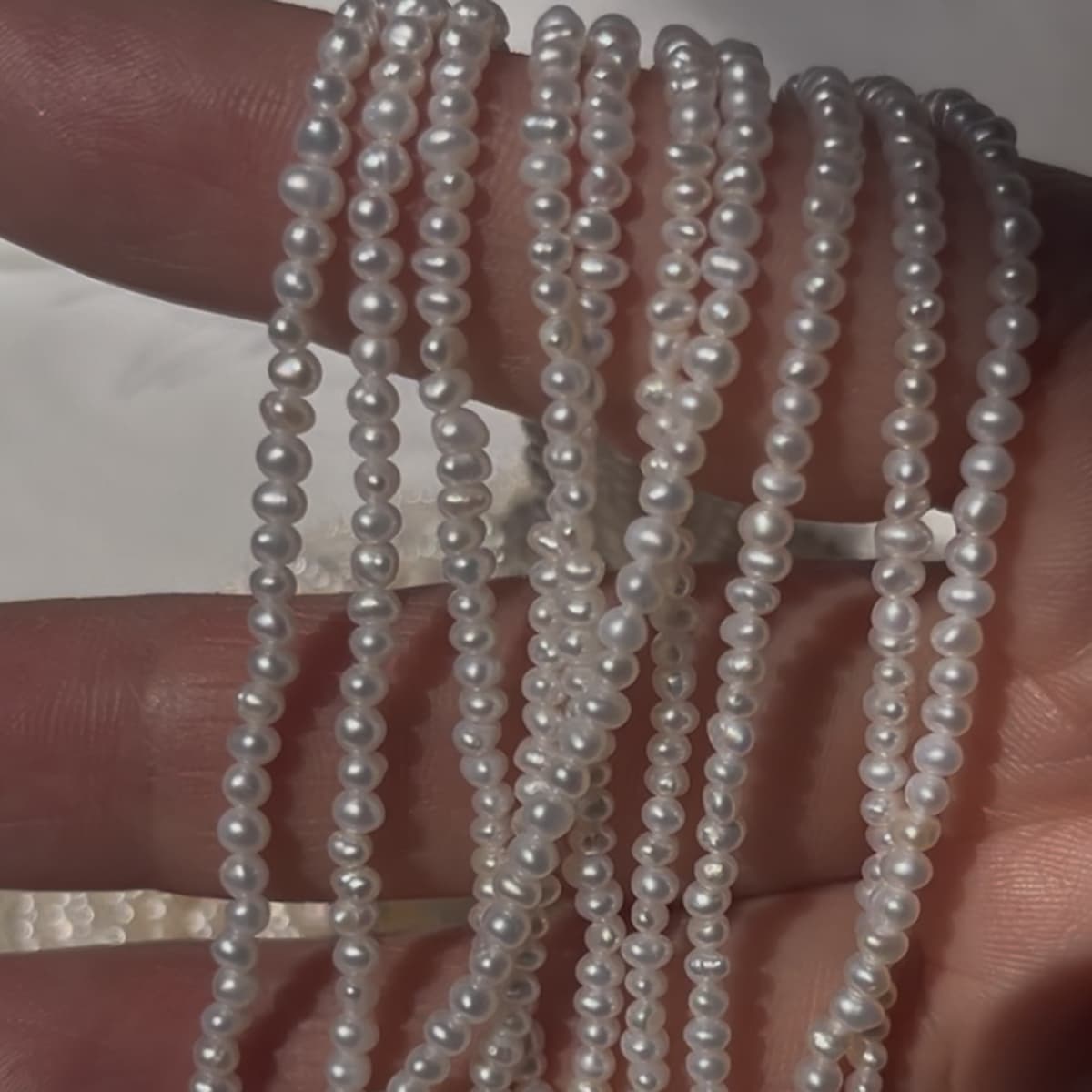 2.5-3mm oval/potato pearl strand white - 4A