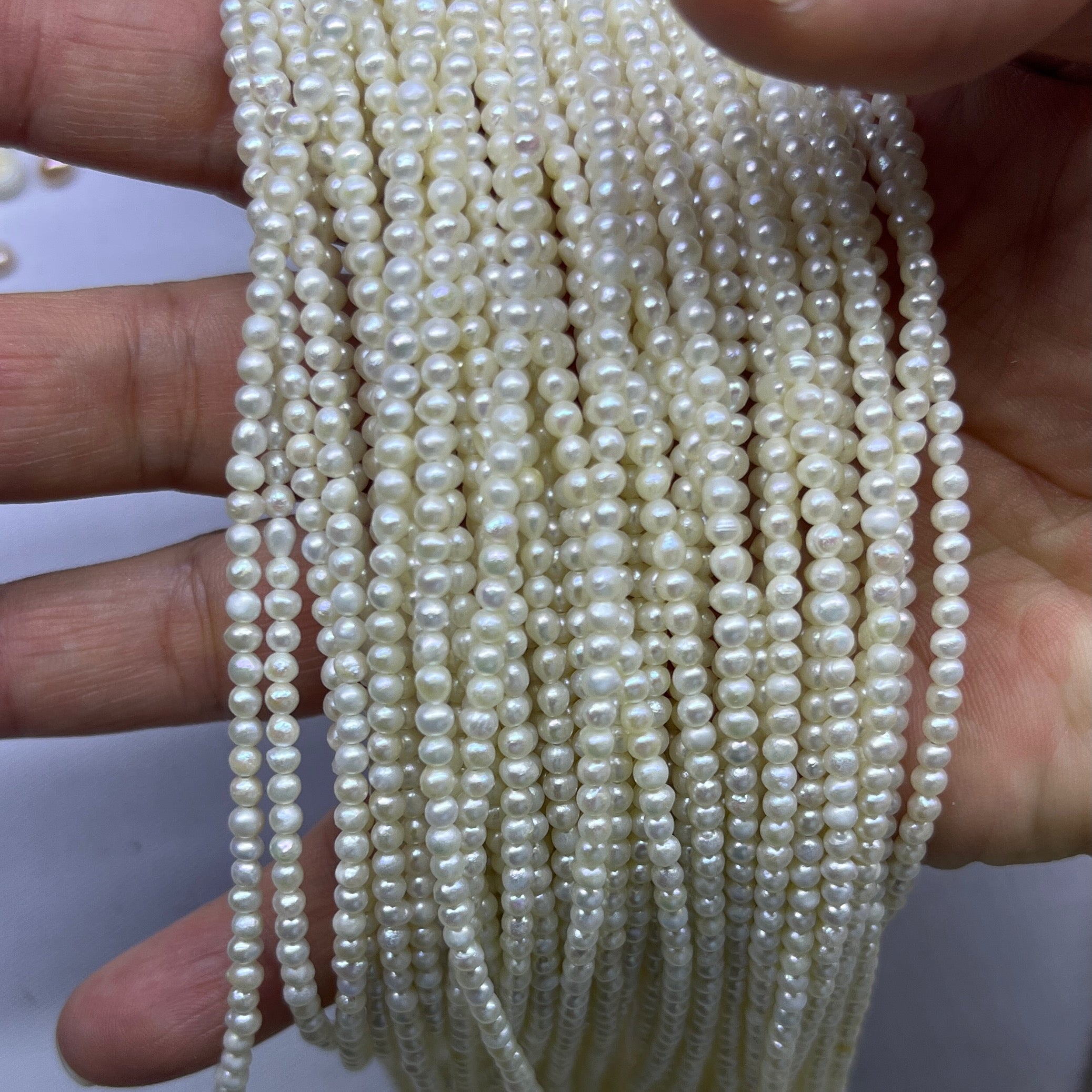 3-4mm off round freshwater pearl strand white-3A Price for 100 strand