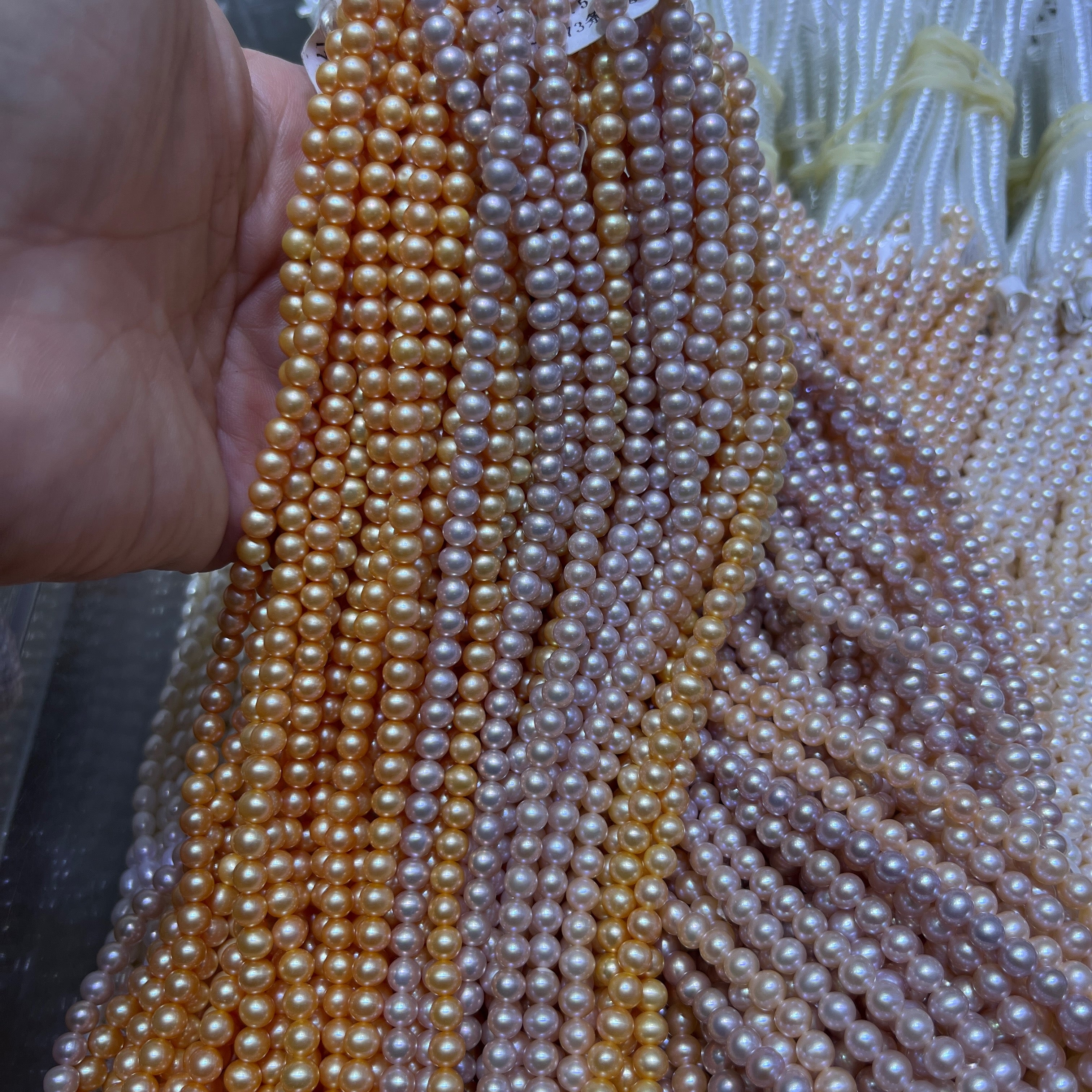 4-5mm round orange rose pearl strand