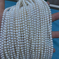 4-5mm near round white freshwater pearl strand - 4A MOQ 100 strands