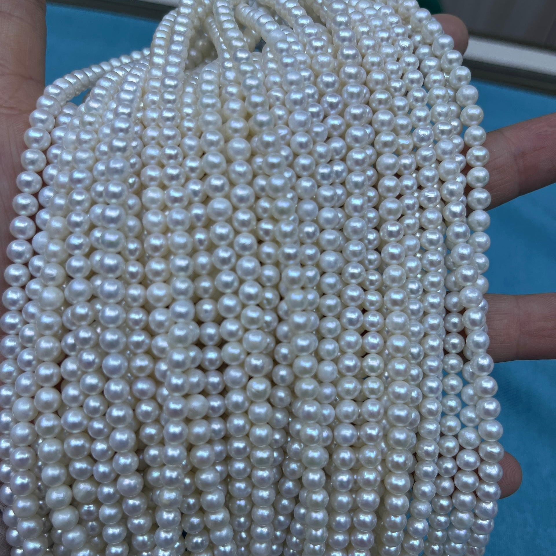 4-5mm near round white freshwater pearl strand - 4A MOQ 100 strands