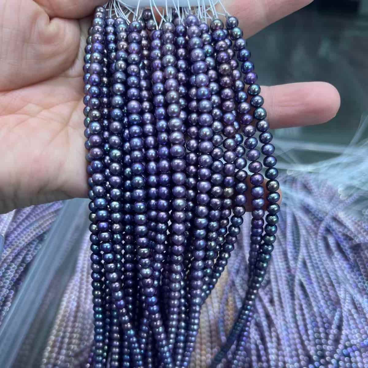 4–5mm Round Vivid Purple Pearl Strand – 4A