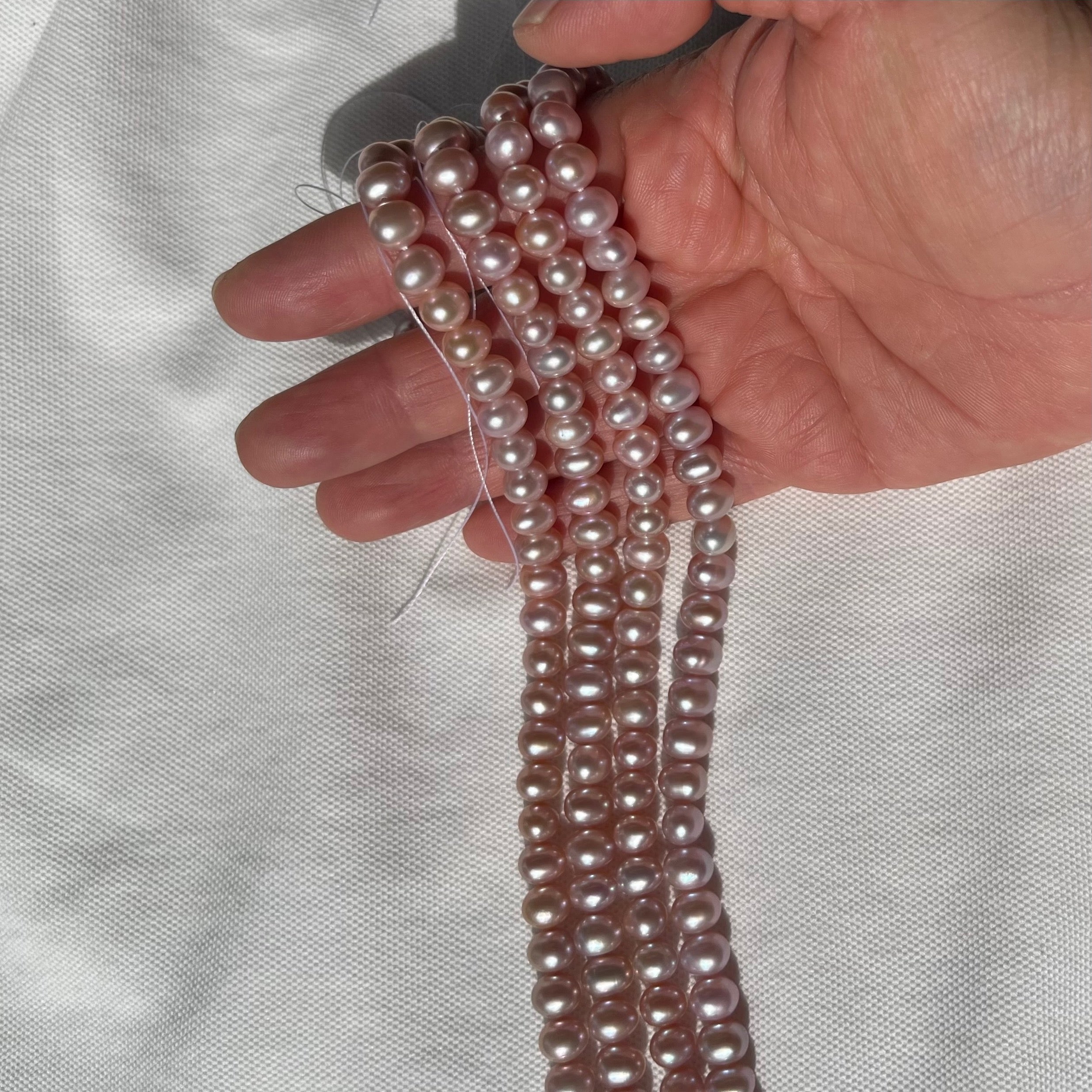 6-7mm_oval_pearl_strand_pink