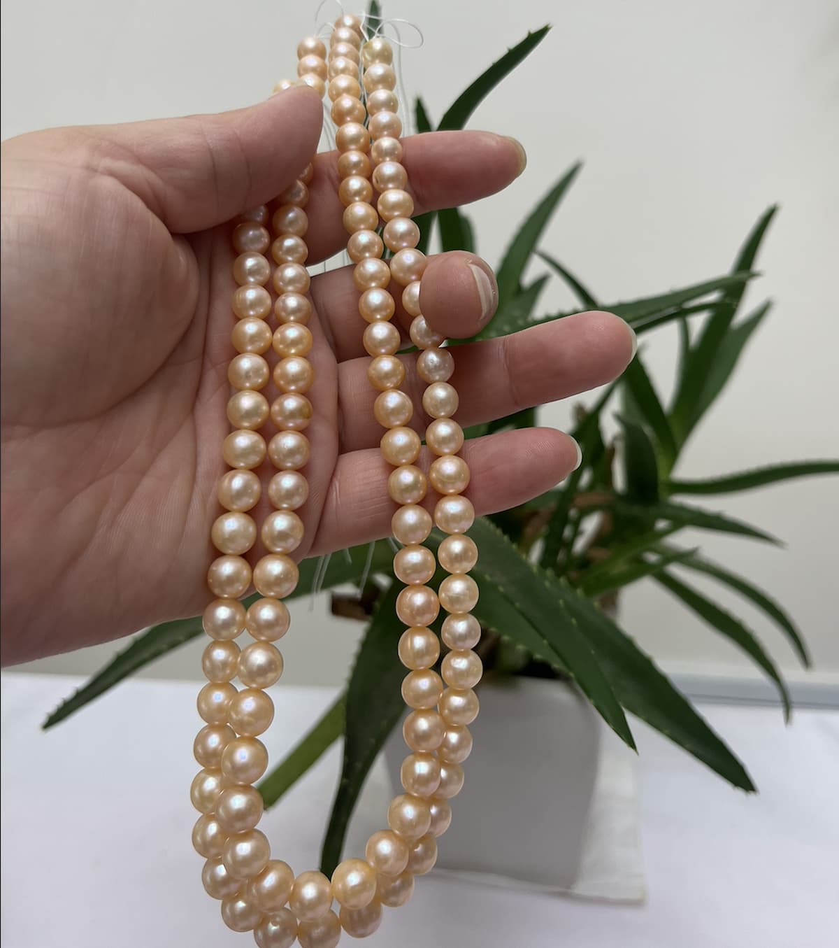 7-8mm near round peach pearl strand