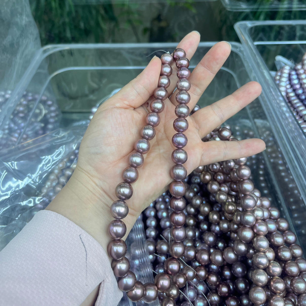 11-14 mm round Reddish Pink pearl strand - 5A
