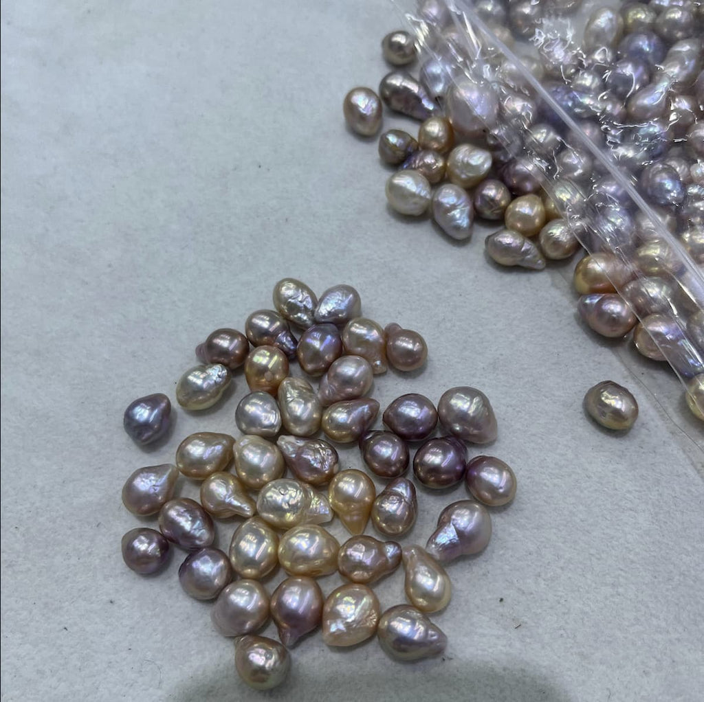 loose baroque pearl with nose 