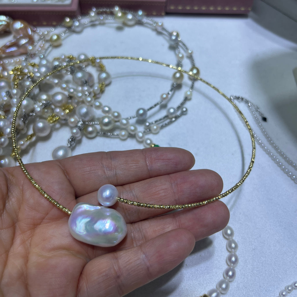 Pearl Necklace with 8mm round pearl and 16mm baroque pearl - A Study in Modern Proportion