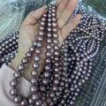 11-14 mm round Reddish Pink pearl strand - 5A