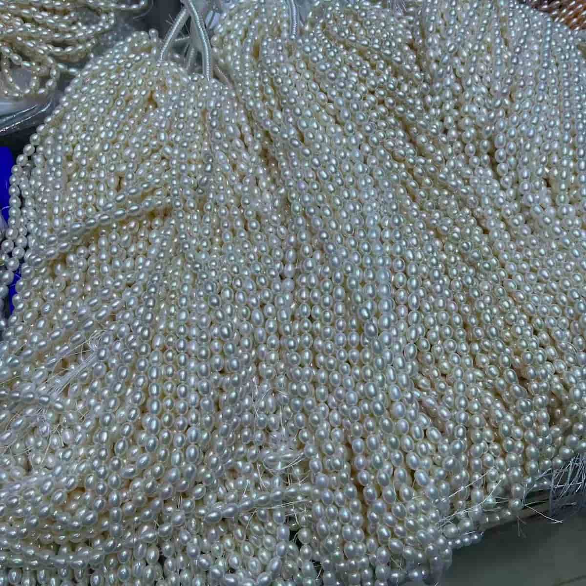 7mm rice pearl strand white orange pink - 4A